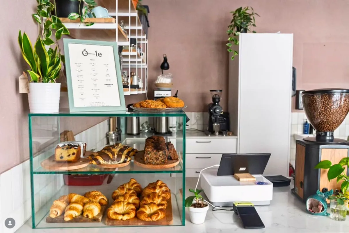 Pastries, cakes and menu board at Kaffi Ó-le counter in Reykjavik