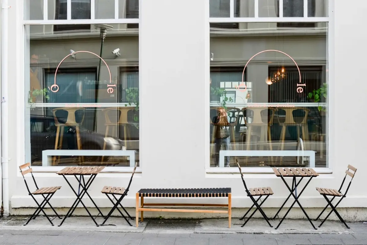 Kaffi Ó-le storefront with outdoor seating in Reykjavík