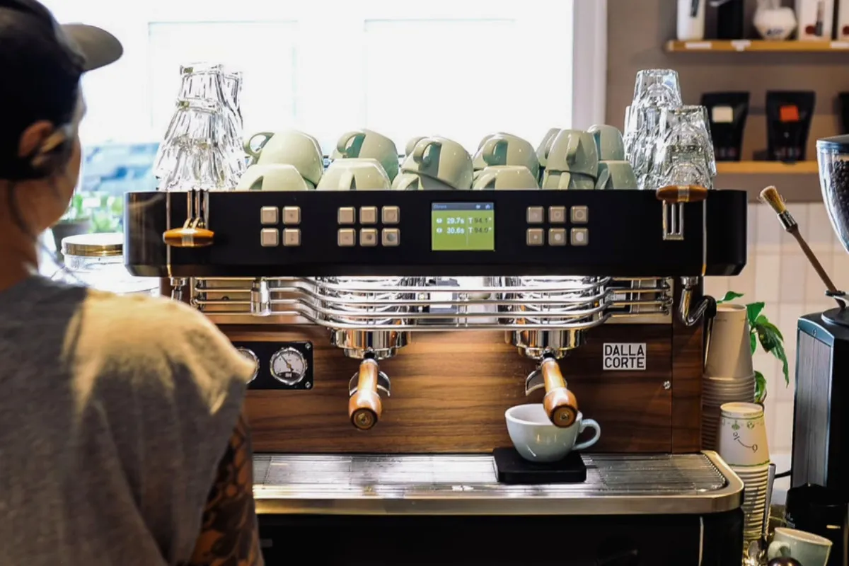 Barista preparing coffee at Kaffi Ó-le Reykjavík